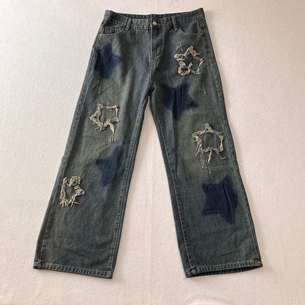 Trendy distressed star patch jeans.